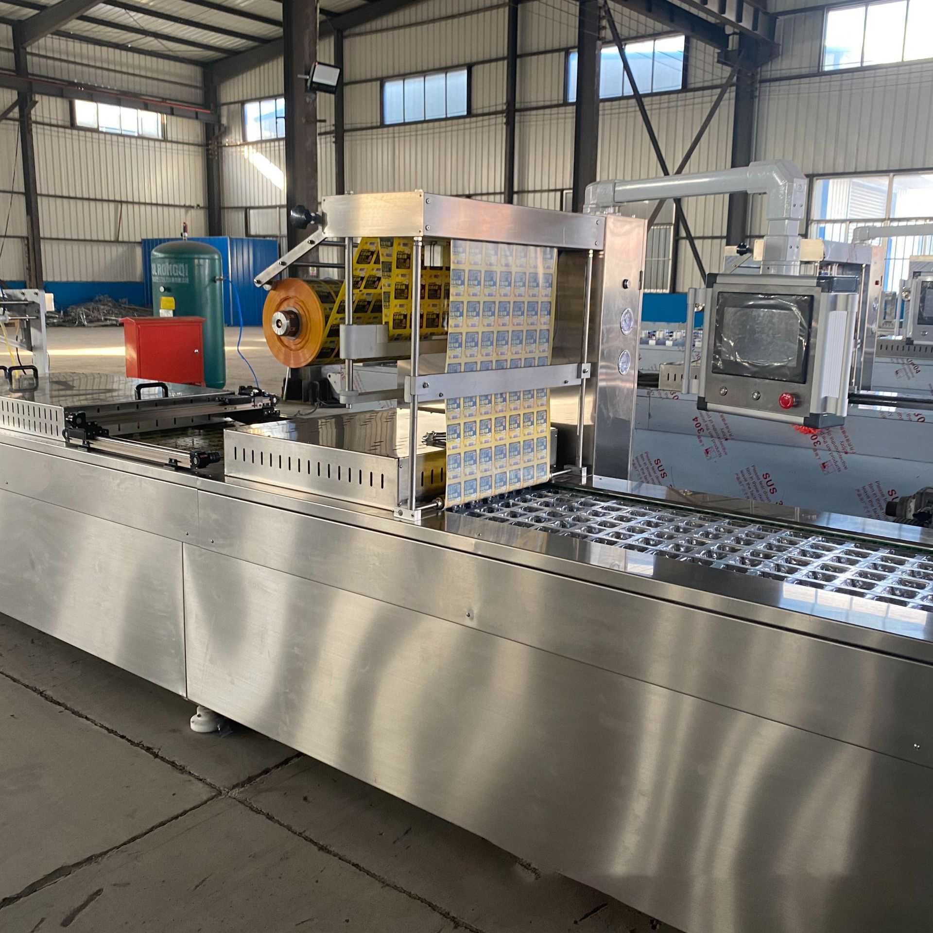 Stretch film vacuum packaging machine