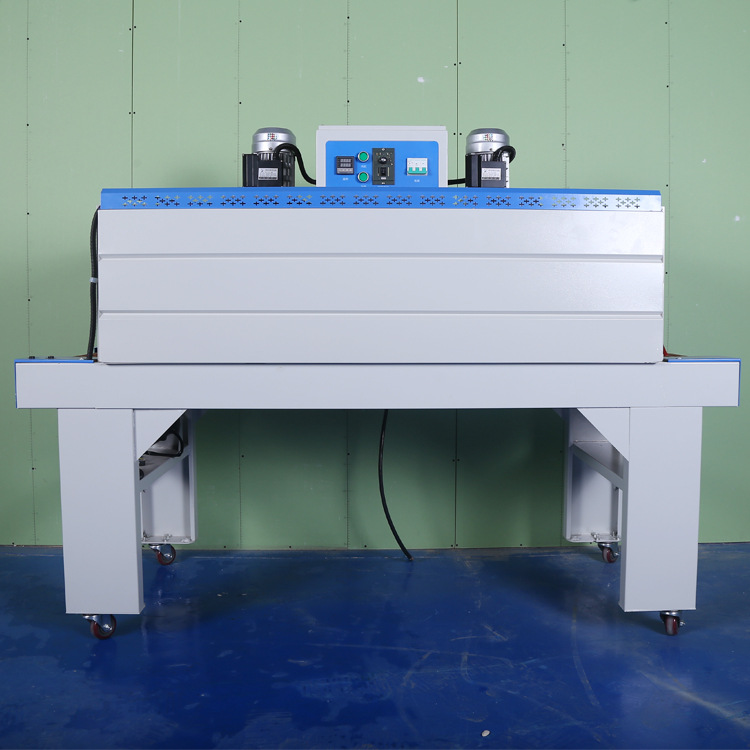 Heat shrink packaging machine