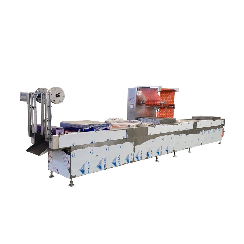 Stretch film vacuum packaging machine